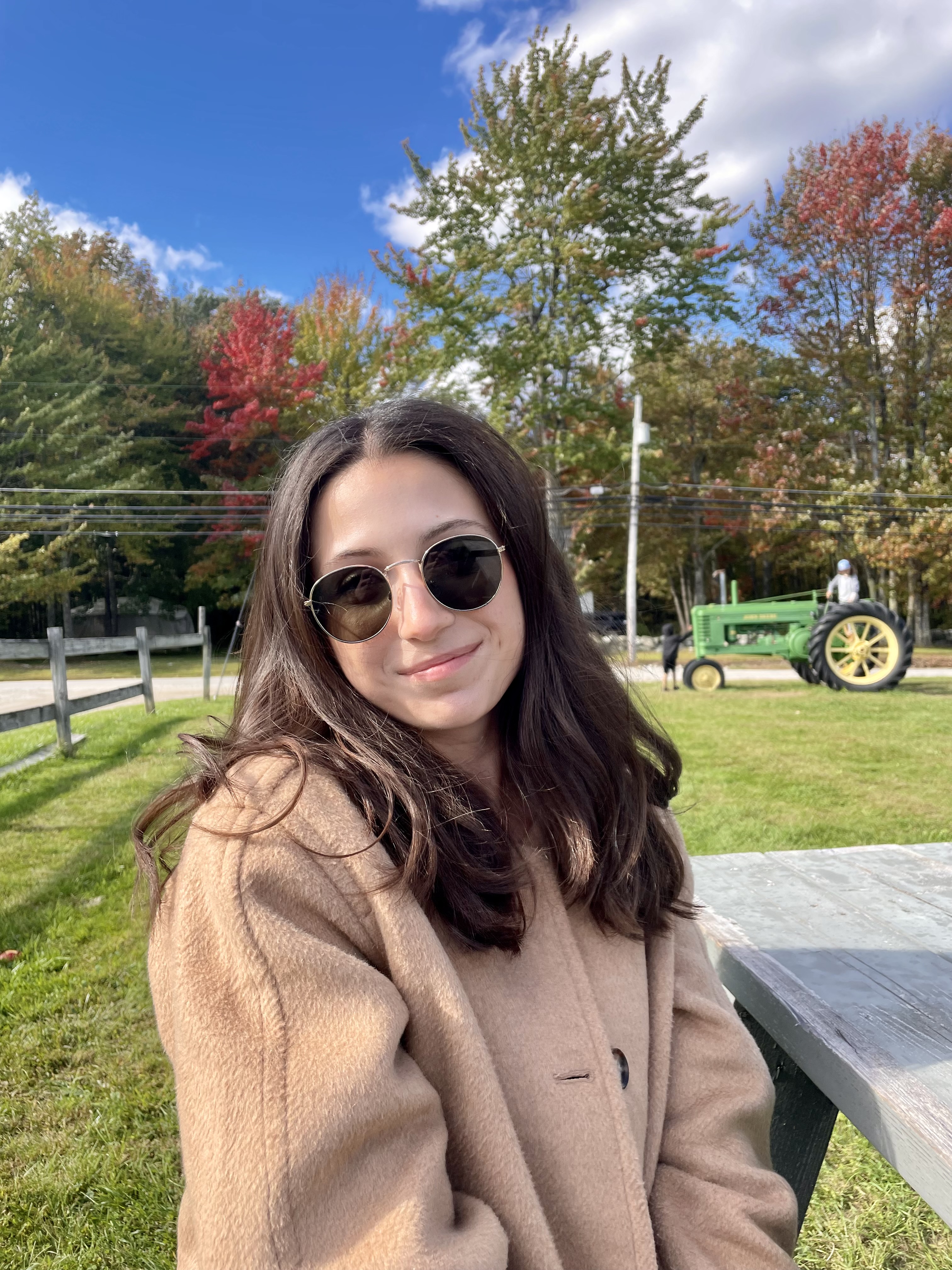 Olivia sitting at a picnic table